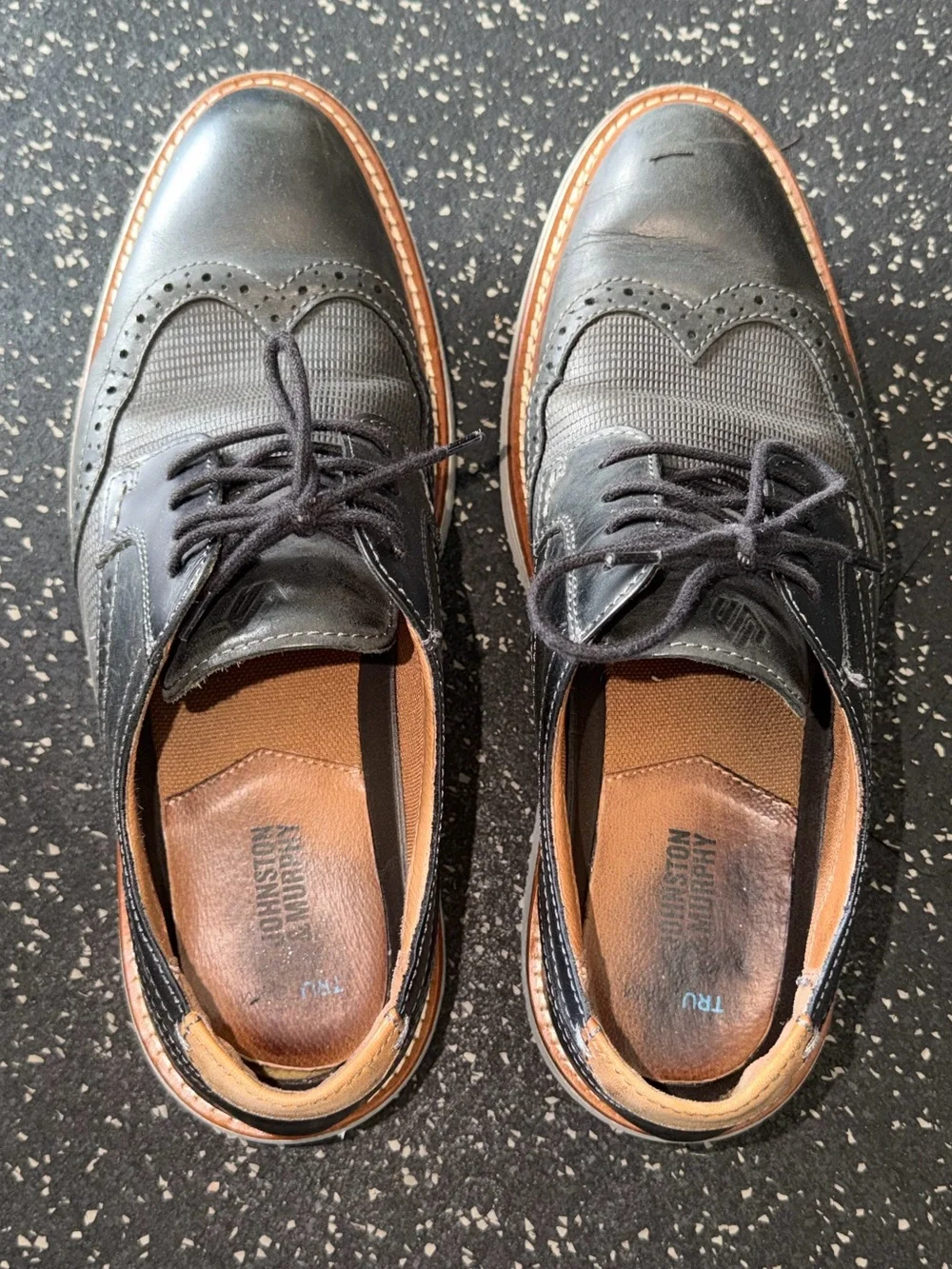 Johnston & Murphy Black Leather Wingtip Oxfords with Tan Welt